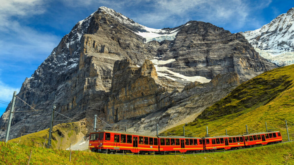 Famous,Electric,Red,Tourist,Train,Coming,Down,From,The,Jungfraujoch